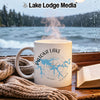 White mug with "Patoka Lake Indiana" and map graphic next to open book.