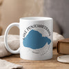 White mug with blue Lake Pontchartrain map and compass graphic, steaming.