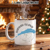 White mug with Kiawah Island map, compass, and text, near a fireplace.