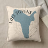 Cream pillow with blue Lake Stevens map and text, on neutral background.