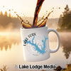 White mug with "Lake Fork Texas" and a map design, with coffee pouring into it.