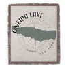 Oneida Lake map with compass rose on a fringed blanket.