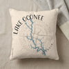 Cream pillow with "Lake Oconee Georgia" text and a blue lake map over a compass rose.