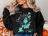 Black sweatshirt with a map of Chain O' Lakes, Illinois.