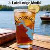Glass of iced tea with a lemon slice and a Texas map design.
