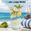 Clear glass with drink, lime, mint, and "Lake Lodge Media" logo.