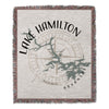 Tapestry blanket with "Lake Hamilton Arkansas" text and compass design.