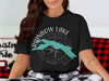Black t-shirt with Rainbow Lake, Maine map and compass design.