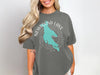 Graphic tee with teal Newfound Lake map and compass on gray shirt.