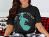 Black t-shirt with teal Lake Tohopekaliga map and compass design.