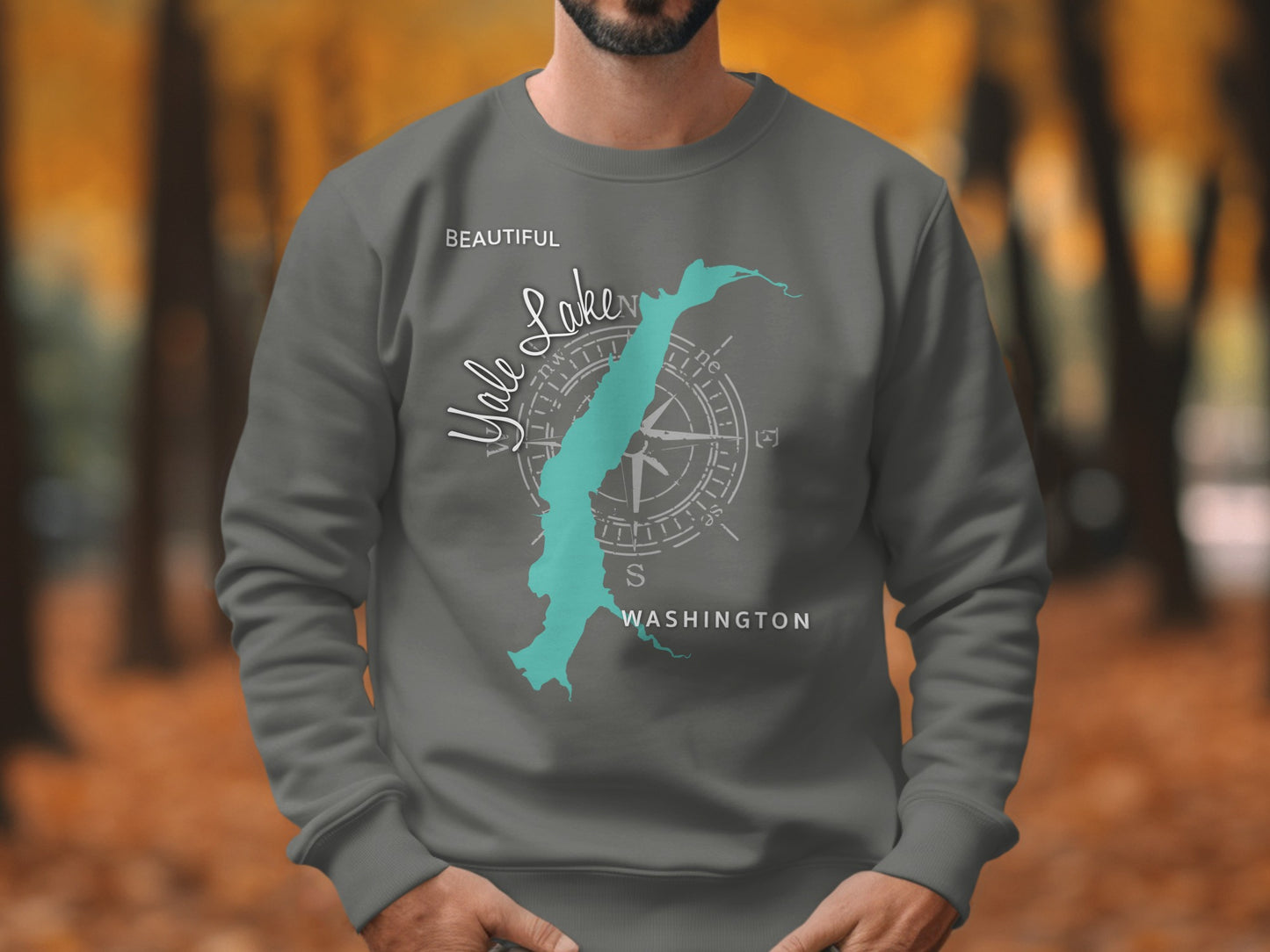 Dark grey sweatshirt with teal map of Lake Wenatchee and compass rose.