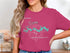Pink t-shirt with "Lake Bowen Beautiful South Carolina" and compass rose graphic.