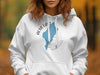 White hoodie with Alta Lake Washington map and compass design.