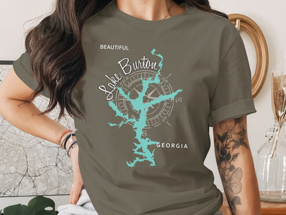 T-shirt with a teal compass rose overlaying a teal map of Lake Burton, Georgia.