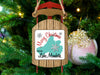 Wooden sled ornament with Lake Mendota map and "Merry Christmas" text.