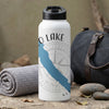 White thermos with blue lake graphic and compass rose, text reads "O LAKE NEW".