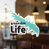 Turquoise lake outline sticker with "grapevine life" text on glass