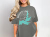 Grey t-shirt with teal Hayden Lake Idaho map and compass graphic.