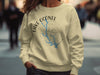 Cream sweatshirt with Lake Oconee, Georgia map and compass graphic.