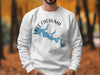White sweatshirt with Lake Cachuma California map and compass design.