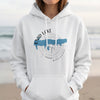 White hoodie with Enid Lake Mississippi map and compass graphic.