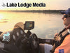 Man driving a boat with "Lake Lodge Media" logo and "Beaver Lake Life" sticker.