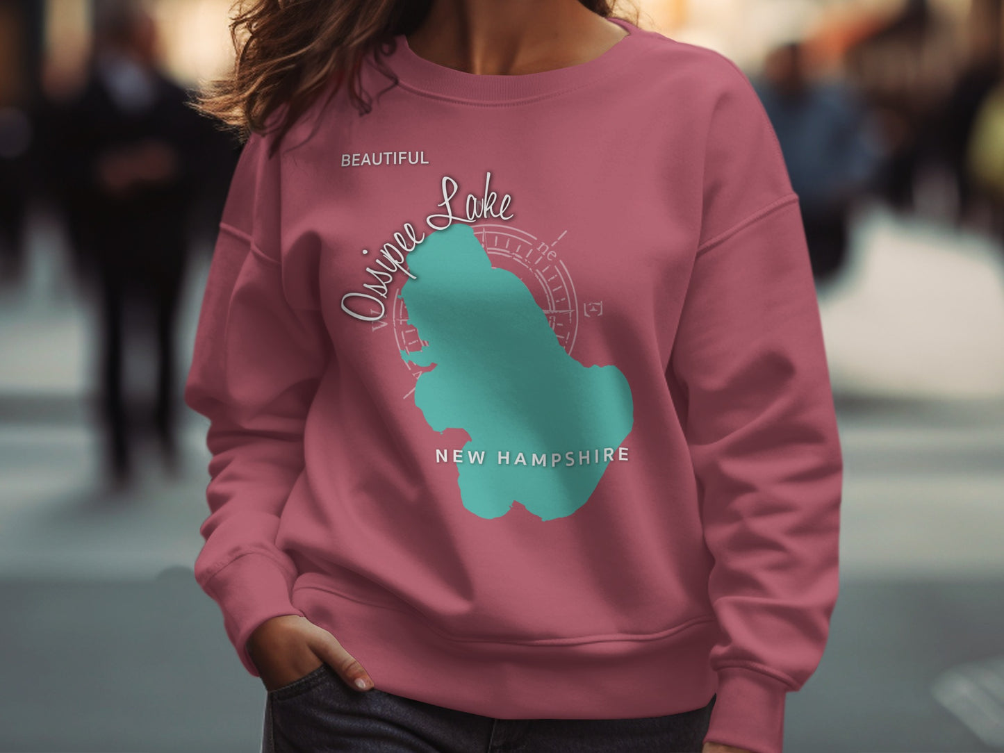 Pink sweatshirt with Lake Ossipee New Hampshire graphic.