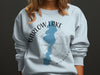 Light blue sweatshirt with Barlow Lake Michigan map and compass graphic.
