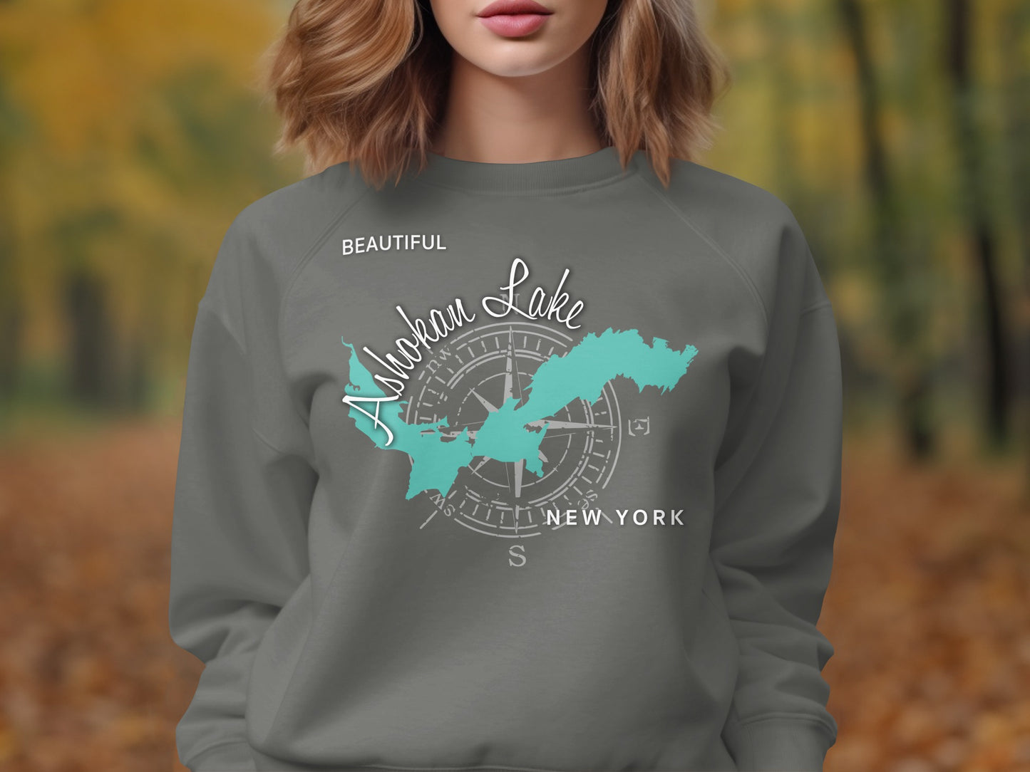Gray sweatshirt with "Ashokan Lake, New York" and compass graphic.