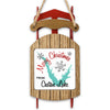 Wooden sled ornament with "Merry Christmas FROM Castaic Lake" and snowflakes.