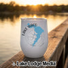 White insulated wine tumbler featuring a blue map of Lake Waco over a compass design on a wooden dock.