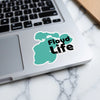 Teal Floyd Life sticker with black text on a laptop.