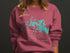 Crewneck sweatshirt with "Canyon Lake Texas" and compass rose design.