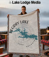 DeGray Lake Arkansas map throw blanket with fringed edges, held by a man.