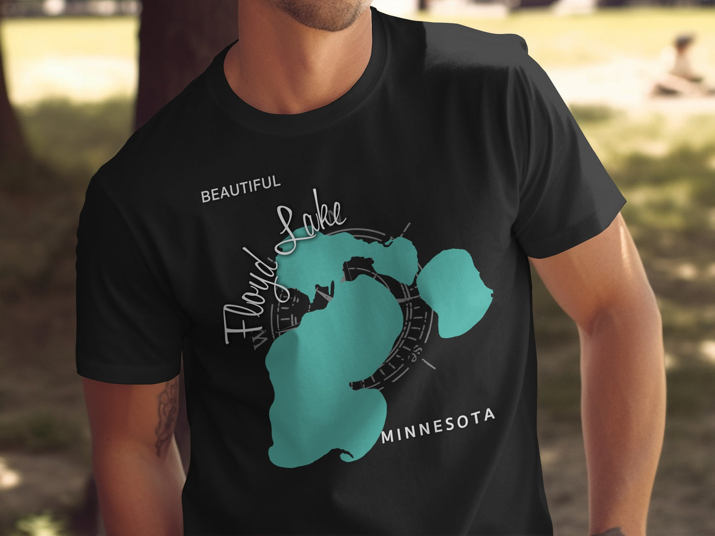 Black t-shirt with turquoise map outline of Floyd Lake, Minnesota.