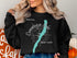 Black sweatshirt with "Beautiful Canandaigua Lake New York" map design.