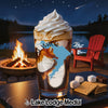 Drink with whipped cream and map overlay, near campfire and lake.