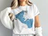 White t-shirt with Sylvan Lake South Dakota shape and compass graphic.