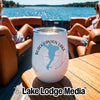 White stainless steel wine tumbler with Black Canyon Lake Arizona graphic resting on a wooden boat table.