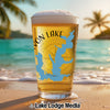 Glass of beer with blue Texas map outline and "Von Lake" text on beach.