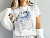 White t-shirt with Beaver Lake Arkansas map and compass design.