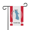 Garden flag with "Peyto Lake" and silhouette on compass over Canadian flag.