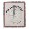Lake Champlain Vermont map on textured blanket with compass and fringe.