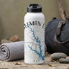 White water bottle with "Coleman Lakes" text, a lake map, and compass rose graphic.