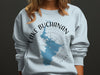 Light blue sweatshirt with Lake Buchanan Texas map graphic and compass design.