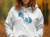 White hoodie with Pearl Lake Wisconsin graphic and compass design.