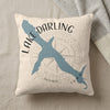 Cushion with blue Lake Darling outline, compass, and text "IOWA".