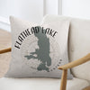 Pillow with Flathead Lake map and Montana text over compass design.