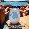 White insulated wine tumbler featuring a map and the text Buffalo Lake Minnesota sitting on a boat table.