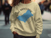 Crewneck sweatshirt with Lake Mascuppic New Hampshire graphic and compass rose.